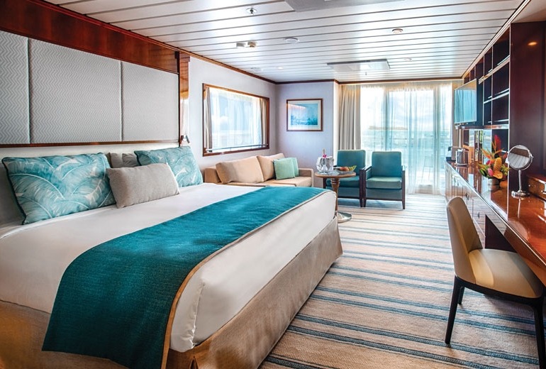 View of a Grand Suite stateroom aboard the luxury small-shop m/s Paul Gauguin