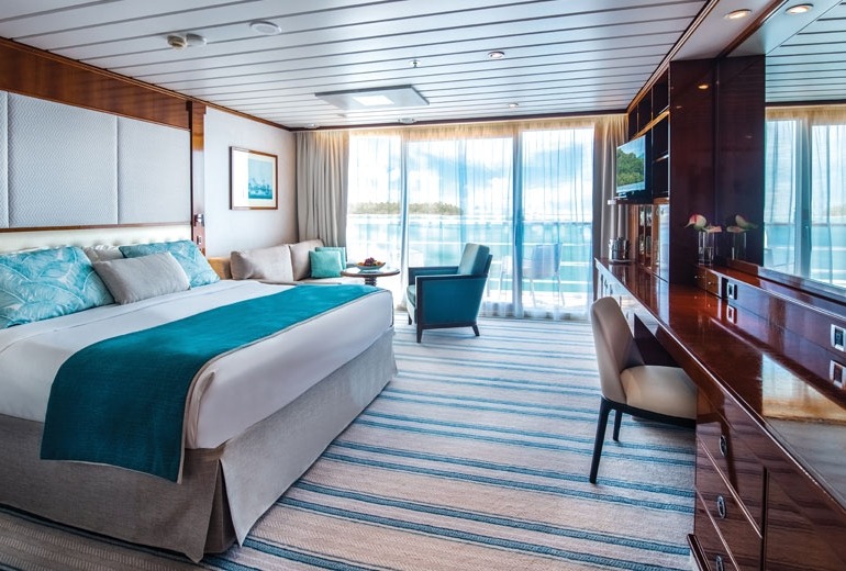 View of a Veranda Suite stateroom aboard the luxury small-shop m/s Paul Gauguin